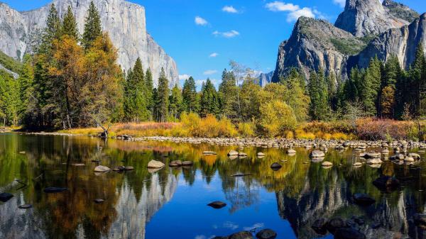 calm lake with reflection of mountains under blue sky hd nature