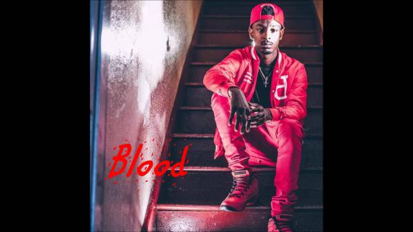 Free 21 savage is wearing red dress and cap sitting on steps hd 21 savage wallpaper download