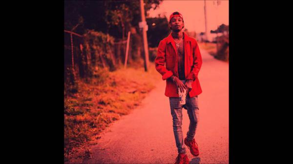 Free 21 savage is wearing red shirt and blue jeans walking on road hd 21 savage wallpaper download