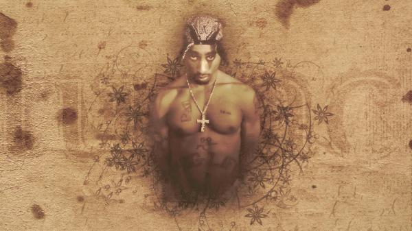 Free 2pac tupac is having cross on neck and tattoos on chest and abdomen hd music wallpaper download