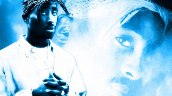 Free 2pac tupac is wearing white shirt and handkerchief on head in blue background hd music wallpaper download