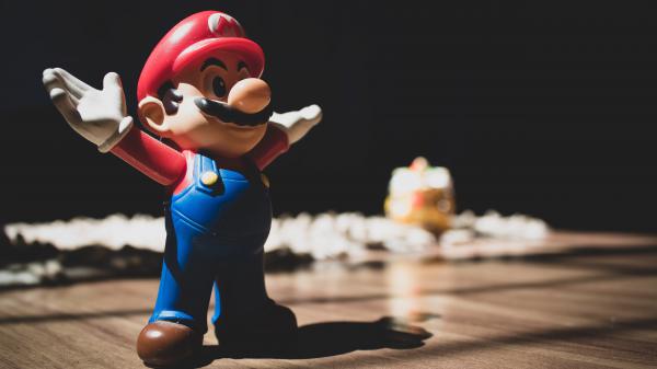 Free 3d super mario figurine on brown surface 4k 5k hd wallpaper download