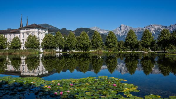 Free abbey alps austria monastery mountain with reflection on river hd travel wallpaper download