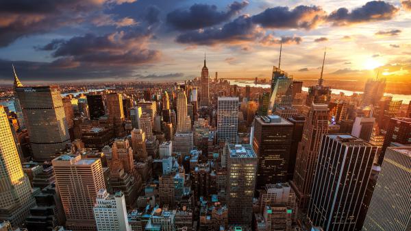 Free aerial view of buildings during sunrise hd new york wallpaper download