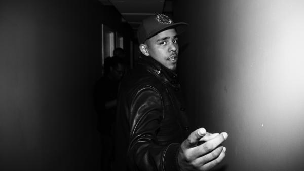 Free black and white photo of j cole wearing black dress and cap 4k hd music wallpaper download