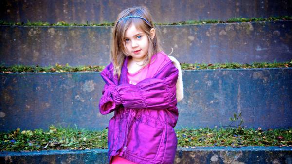 Free blue eyes cute little girl is wearing purple jacket standing in front of steps hd cute wallpaper download