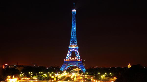 Free blue lighting paris eiffel tower with background of black sky during nighttime hd travel wallpaper download