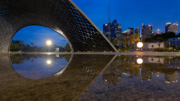 Free bridge reflection on body of water during nighttime with lightning buildings hd travel wallpaper download