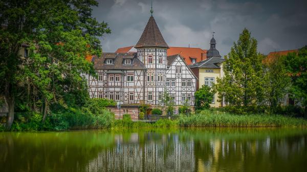 Free building and house in germany with reflection on river 4k hd travel wallpaper download