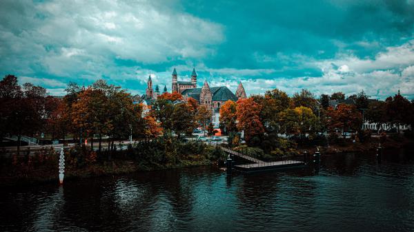 Free castle with pier near river under blue cloudy sky 4k hd travel wallpaper download