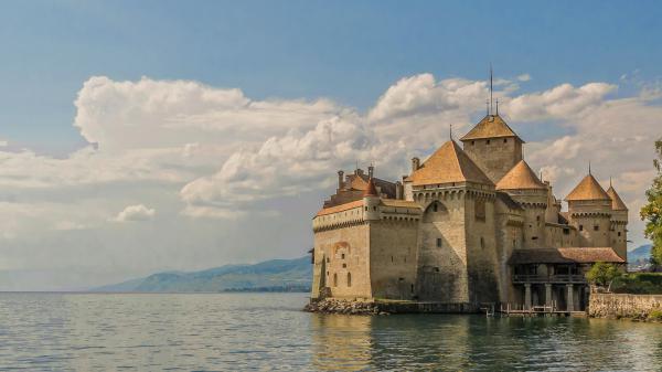 Free chateau de chillon chillon castle in the middle of river in geneva switzerland hd travel wallpaper download