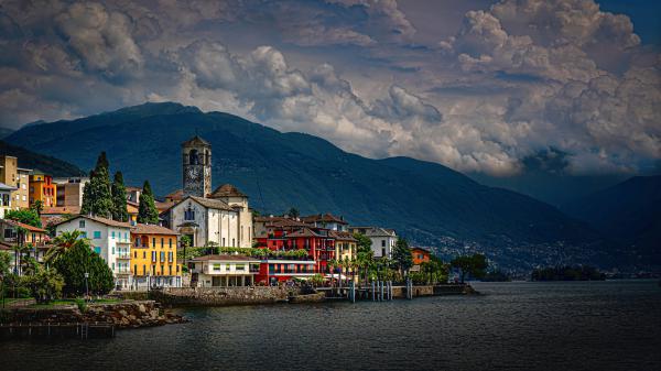 Free church under cloudy sky alps brissago building along with lake and landscape of green covered mountain switzerland 4k 5k hd travel wallpaper download