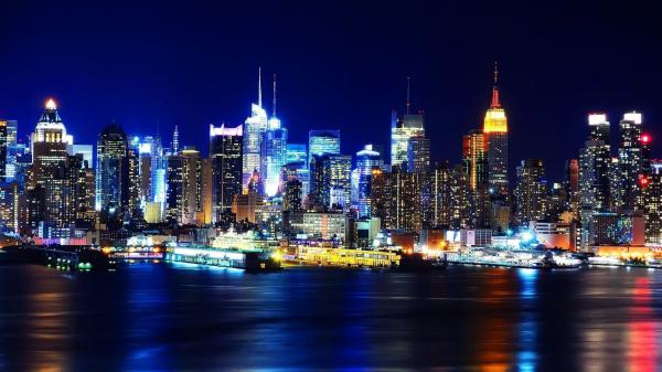 Free colorful lighting buildings during nighttime with reflection on river hd new york wallpaper download