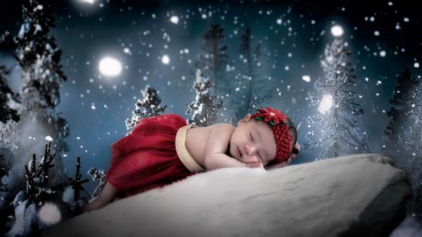 Free cute baby girl is sleeping on snow covered rock with starry background wearing red dress and band on head hd cute wallpaper download