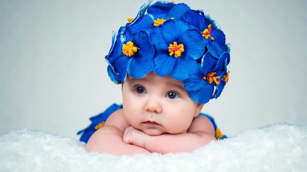 Free cute baby lying wearing vilote flowers in head 4k 5k hd cute wallpaper download