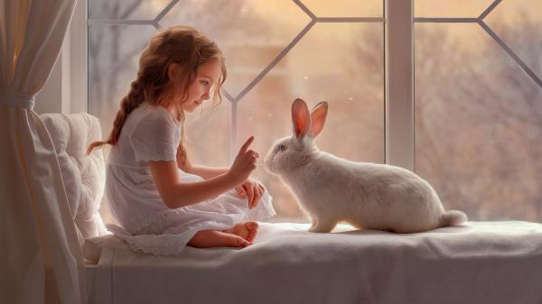 Free cute girl and rabbit wallpaper download