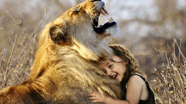 Free cute girl with lion wallpaper download