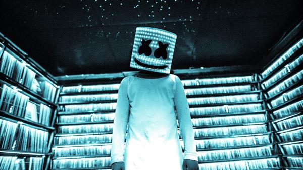 Free dj marshmello in led light bookshelves background wearing white dress hd marshmello wallpaper download