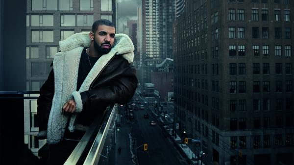 Free drake is standing in building background wearing black jerkin hd drake wallpaper download