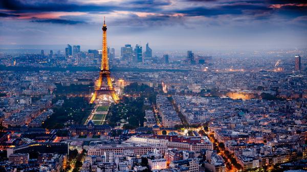 Free eiffel tower and the cityscape of paris with background of clouds during evening time hd travel wallpaper download