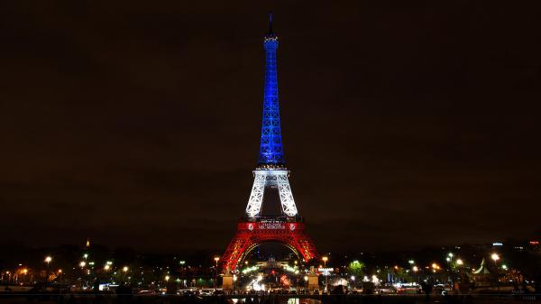 Free eiffel tower paris with blue white and red lights with dark brown sky background hd travel wallpaper download