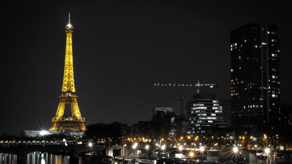 Free eiffel tower with yellow lighting with black sky background during night time 4k 5k hd travel wallpaper download