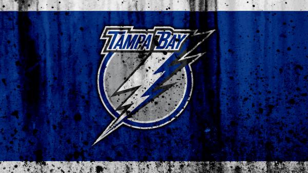 Free emblem logo nhl tampa bay lightning in blue and white paint background basketball 4k hd sports wallpaper download
