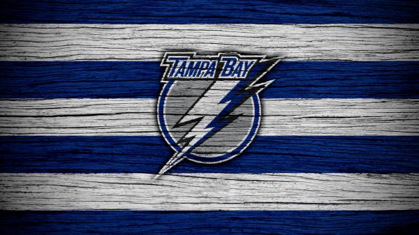 Free emblem logo nhl tampa bay lightning in blue and white striped background basketball 4k hd sports wallpaper download