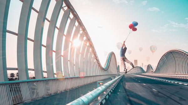 Free flying at dubai bridge 4k 5k wallpaper download