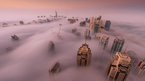 Free fog covered city dubai united arab emirates hd travel wallpaper download