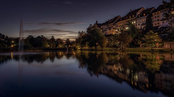 Free fountain building with reflection on river in switzerland 4k hd travel wallpaper download