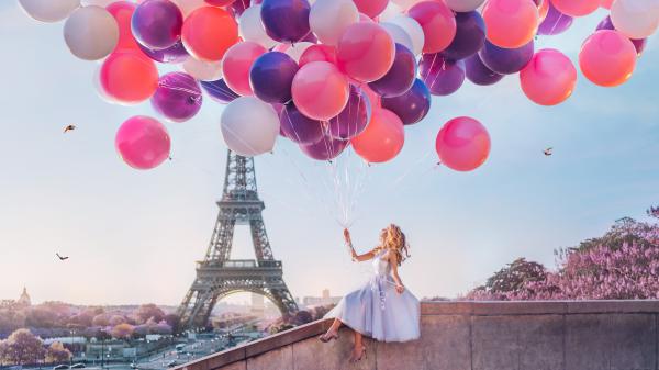 Free girl with lots of balloons sitting on the wall with background of eiffel tower paris 4k 8k hd travel wallpaper download