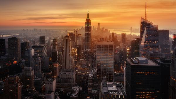 Free high rising buildings of new york cityscape during sunset hd new york wallpaper download