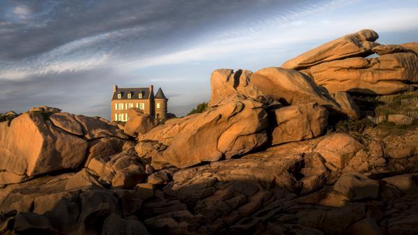 Free house on rock under cloudy sky in france hd travel wallpaper download