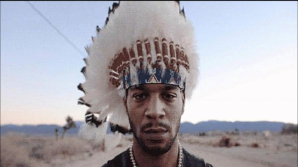 Free kid cudi is having white feather crown in head hd kid cudi wallpaper download