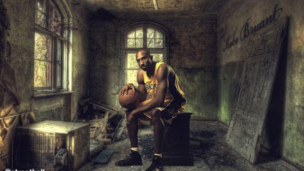 Free kobe bryant is sitting with a ball in a dirty room hd kobe bean bryant wallpaper download