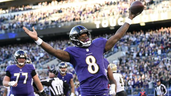 Free lamar jackson is having hands in the air with sprint football wearing purple sports dress and helmet hd sports wallpaper download