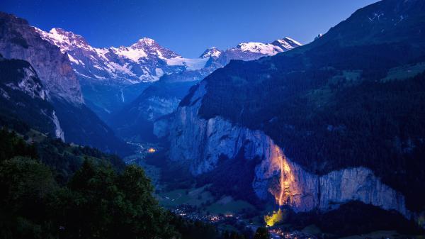 Free landscape of switzerland mountains under starry blue sky during nighttime 4k hd travel wallpaper download