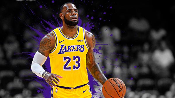 Free lebron james is having basketball in hand wearing yellow sports dress in a black blur background 4k hd sports wallpaper download