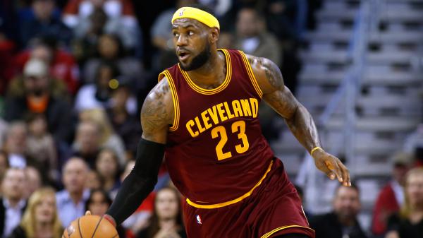 Free lebron james is running and tapping basketball wearing maroon sports dress hd sports wallpaper download