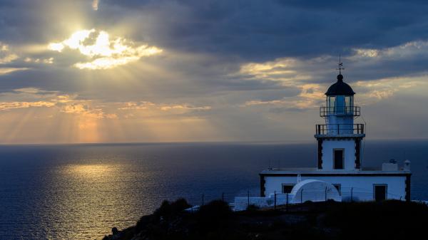 Free lighthouse near sea under dusty cloudy sky 4k 5k travel wallpaper download