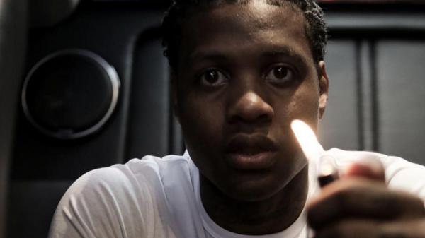 Free lil durk is having fire match in hand wearing white t shirt hd lil durk wallpaper download