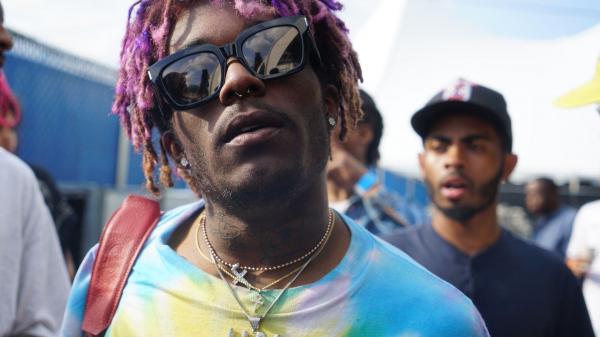 Free lil uzi vert in crowd background wearing blue tshirt and goggles hd music wallpaper download