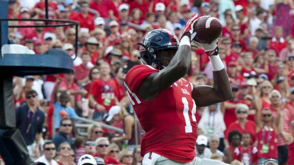 Free metcalf is jumping high with ball in audience background wearing red sports dress hd dk metcalf wallpaper download