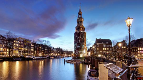 Free netherlands amsterdam city house and boat on canal near tower 4k 5k hd travel wallpaper download