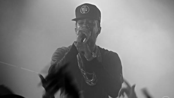 Free nipsey hussle is singing in front of fans wearing black tshirt and cap hd music wallpaper download