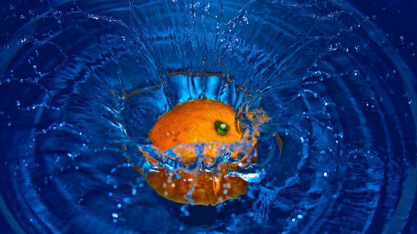 Free orange fruit splash 4k wallpaper download