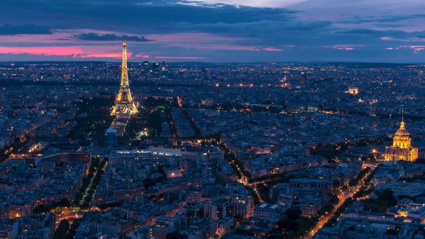 Free paris city and eiffel tower with glittering lights with background of sky and clouds hd travel wallpaper download