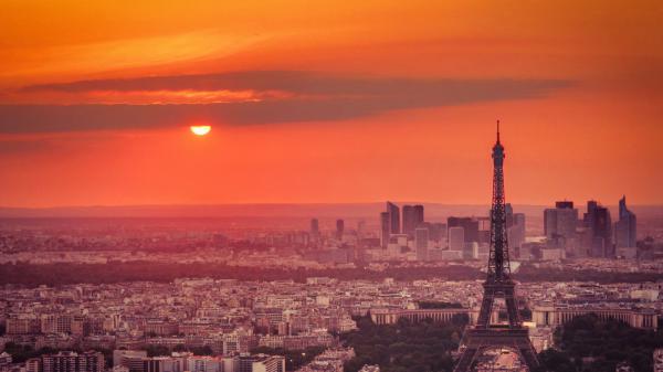 Free paris eiffel tower and france cityscape with orange sky background during sunset hd travel wallpaper download