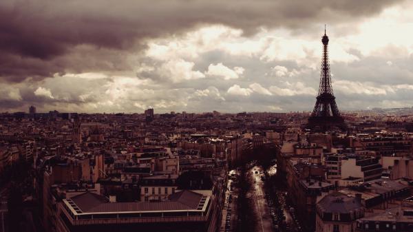 Free paris eiffel tower on side on cityscape of france with background of clouds hd travel wallpaper download